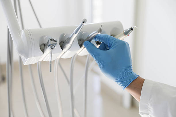 Professional Tooth Extraction technician working in Crystal Lake, IL